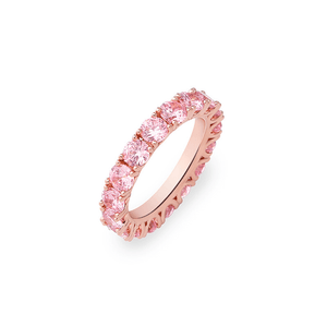 Rose gold ring with pink gemstones on a white background