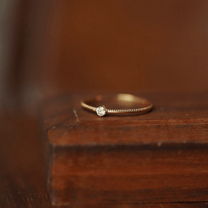 Dainty solitaire single diamond gold milgrain thin band ring