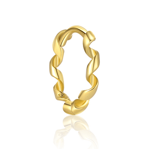 Gold hoop earring on a white background