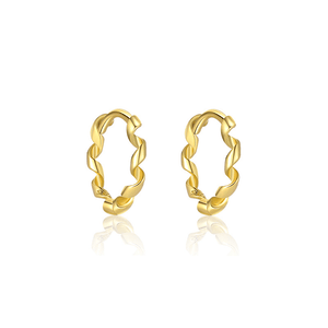 Pair of gold hoop earrings on a white background