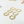 Set of gold hoop earrings on a light background