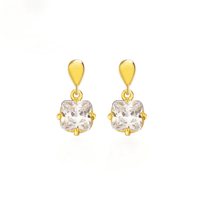 Gold earrings with clear gemstones on a white background
