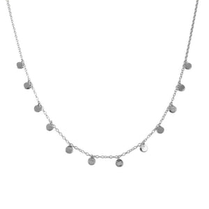Silver necklace with small round pendants on a white background