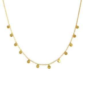 Gold necklace with small round pendants on a white background
