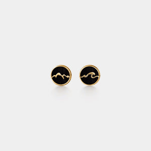 Pair of black and gold earrings on a white background