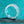 Silver ring with diamonds on a turquoise glitter background