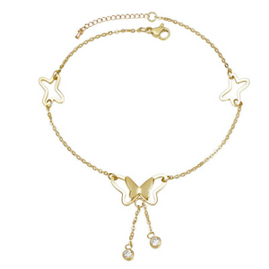 Gold bracelet with butterfly and star designs on a white background