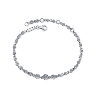 Silver bracelet with small diamonds on a white background