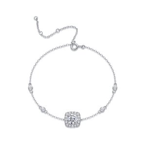 Silver bracelet with a square clasp on a white background
