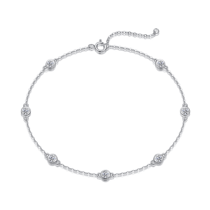 Silver bracelet with small diamonds on a white background