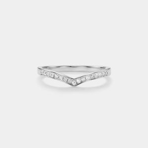 Silver ring with small diamonds on a white background