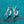 Silver hoop earrings with diamond accents on a teal background
