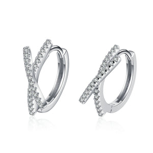 Pair of silver hoop earrings with small diamonds on a white background