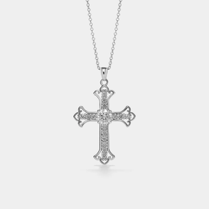 Silver cross necklace with diamonds on a light gray background