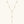 Gold necklace with small diamonds on a light beige background