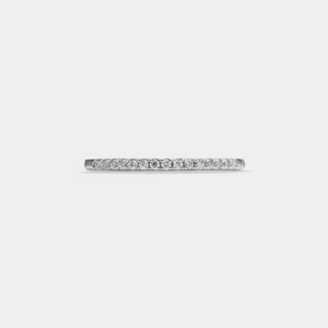 Diamond ring on a light gray background