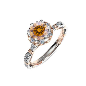 A collection of six moissanite cocktail rings with floral designs, displayed against a white background. The rings feature a variety of colors including blue, yellow, and red, with a hypoallergenic silver finish.