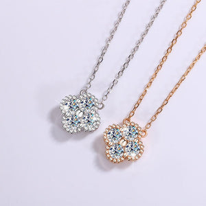Two diamond necklaces on a light purple background