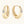 Gold hoop earrings with embedded diamonds on a white background
