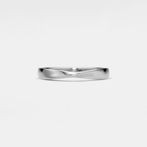Silver ring on a light gray background