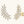 Gold earrings with diamond-like stones on a white background