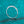 Silver ring with small diamonds on a teal textured background