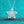 Silver butterfly pendant necklace on a turquoise glittery background