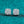 Silver glittery square earrings on a teal glitter background