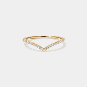 Gold ring with small moissanite on a white background