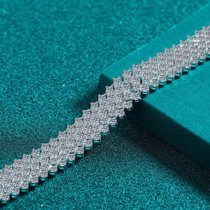 Diamond bracelet on a teal textured background
