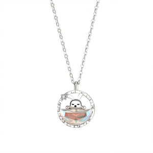 Silver necklace with a pendant featuring a cartoon character in a boat on a white background