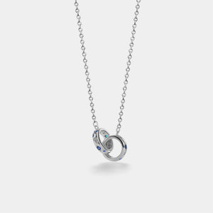 Silver necklace with interlocking rings pendant on a white background