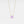 Gold necklace with a purple gemstone on a light gray background