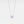 Necklace with a purple gemstone on a light gray background