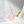 Necklace with a pink teardrop pendant on a soft background