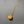 Necklace with a round, textured pendant on a gray background