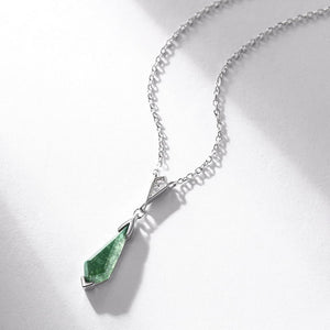 Necklace with a green pendant on a white background