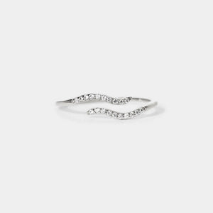 Silver ring with small diamonds on a white background