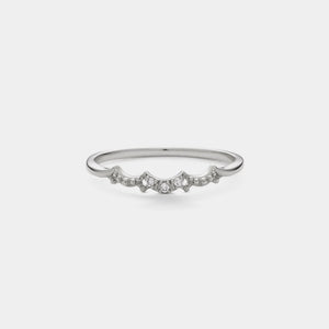 Silver ring with small diamonds on a white background