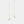 Gold earrings with chain drops on a light gray background