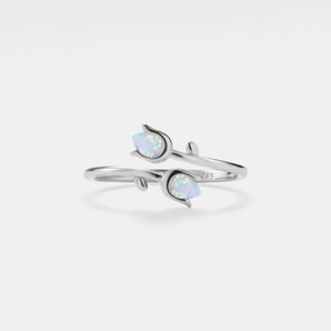 A gold-plated sterling silver ring with opal inlays designed in a bypass style, resembling a tulip flower.