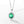 Green gemstone pendant with silver chain on a white background