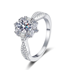 Silver ring with a diamond on a white background