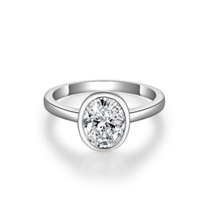 Silver ring with a diamond on a white background