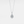 Teardrop-shaped moissanite pendant on a chain against a light gray background