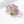 Colorful flower-shaped brooch with gold accents on a white background