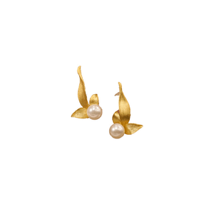 Gold leaf earrings with pearl centers on a white background