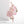 Ornate brooch with pink gemstones on a white background