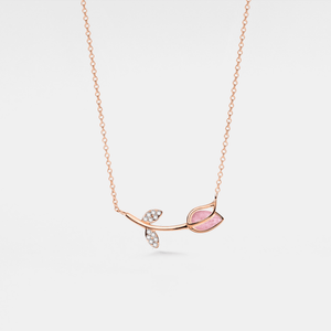 A rose gold-plated necklace with a solid 925 sterling silver chain and a charm featuring a tulip flower with rose quartz petals and cubic zirconia accents.