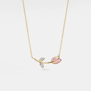 A gold-plated necklace with a solid 925 sterling silver chain and a charm featuring a tulip flower with rose quartz petals and cubic zirconia accents.